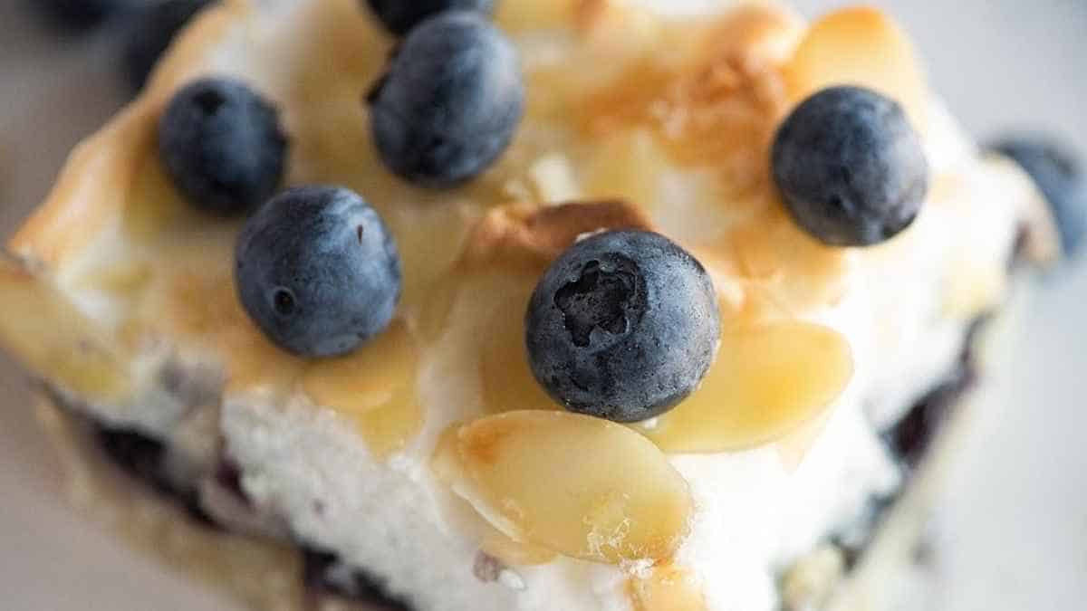 A close up of a blueberry meringue pie.