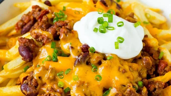 Chili cheese fries with sour cream.