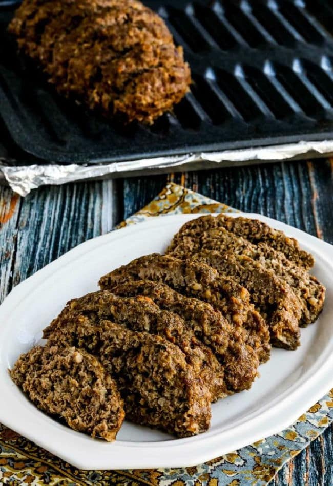 Kalyn's Best Meatloaf shown on serving plate and also on baking rack in background. 
