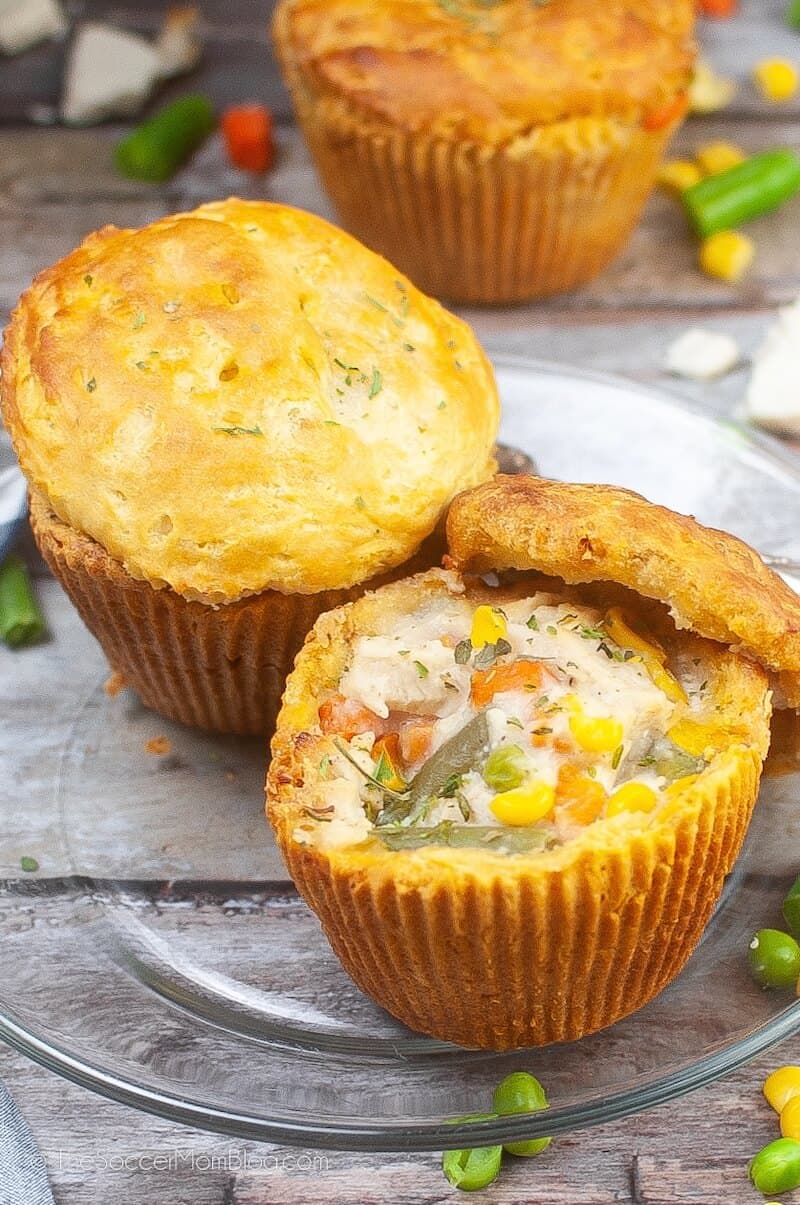 two mini chicken pot pies, one with top cut off.
