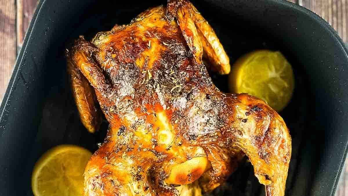 Air Fryer Whole Roast Chicken With Lemon And Garlic. 