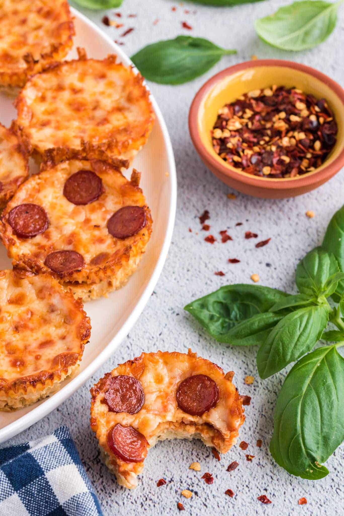 Pepperoni pizza bites on a plate.