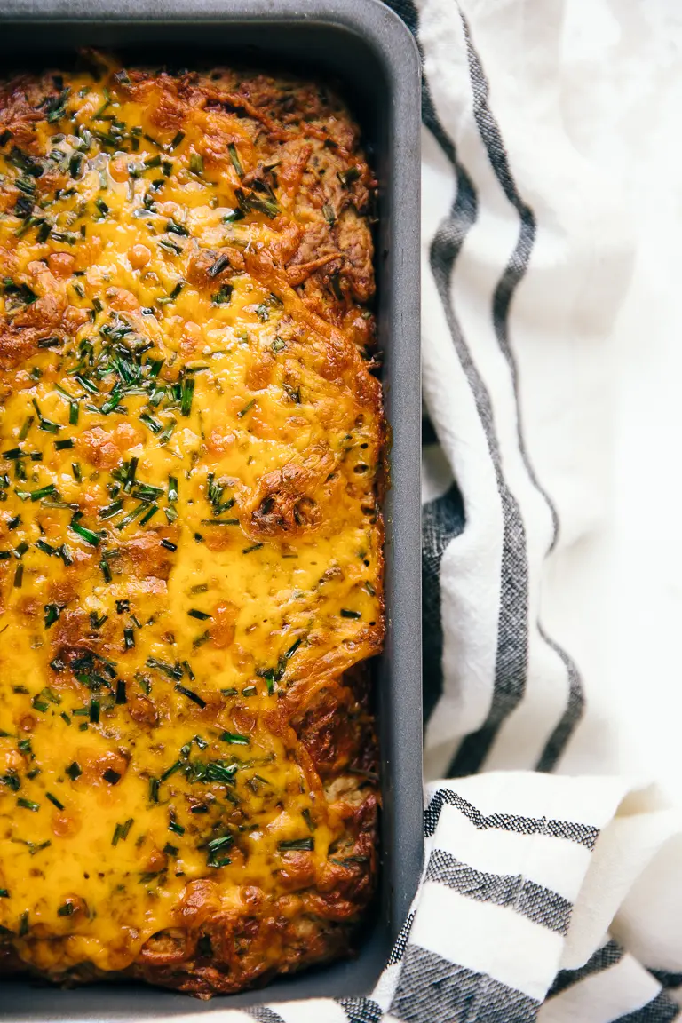 cheesy zucchini quick bread with melted cheese.
