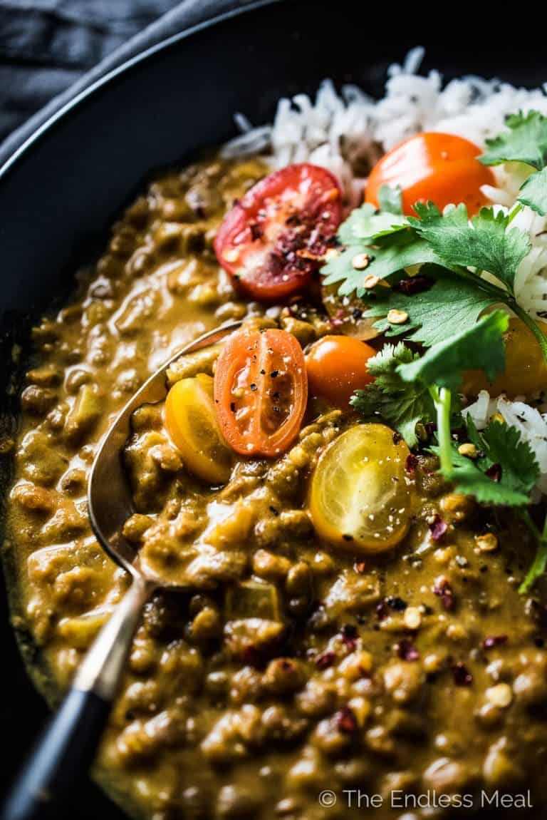 This delicious Crock Pot Lentil Curry is a slow cooker version of the most popular recipe on the blog. Throw everything into your pot, set the timer, and come home to a tasty vegetarian (and vegan!) dinner. You will LOVE it! 
