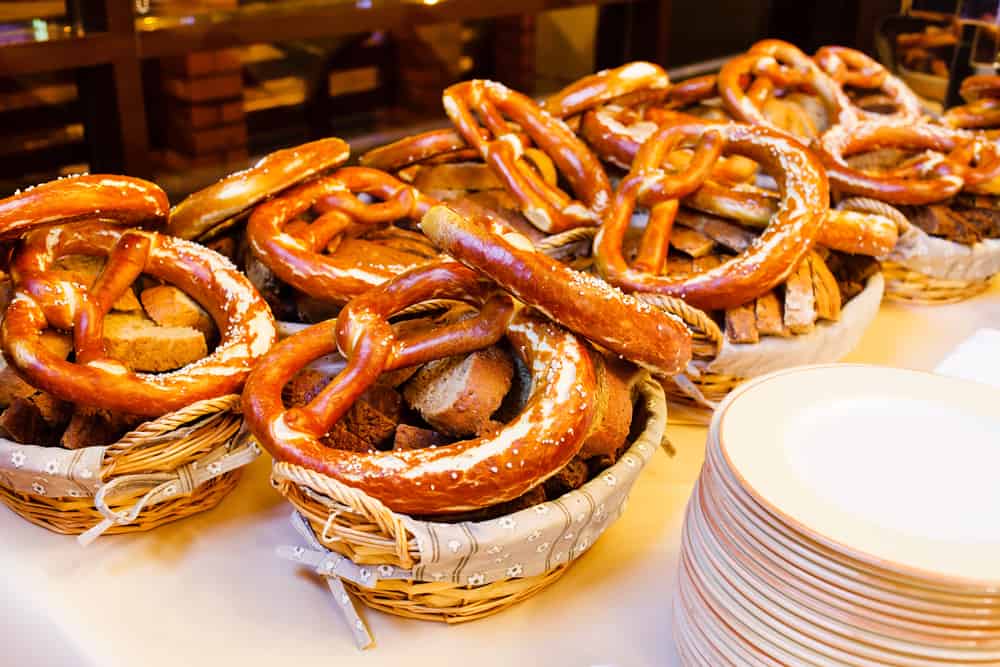 Baskets of pretzels on a table.