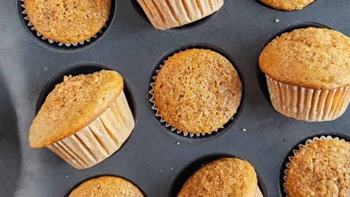 Pumpkin muffins in a muffin tin.