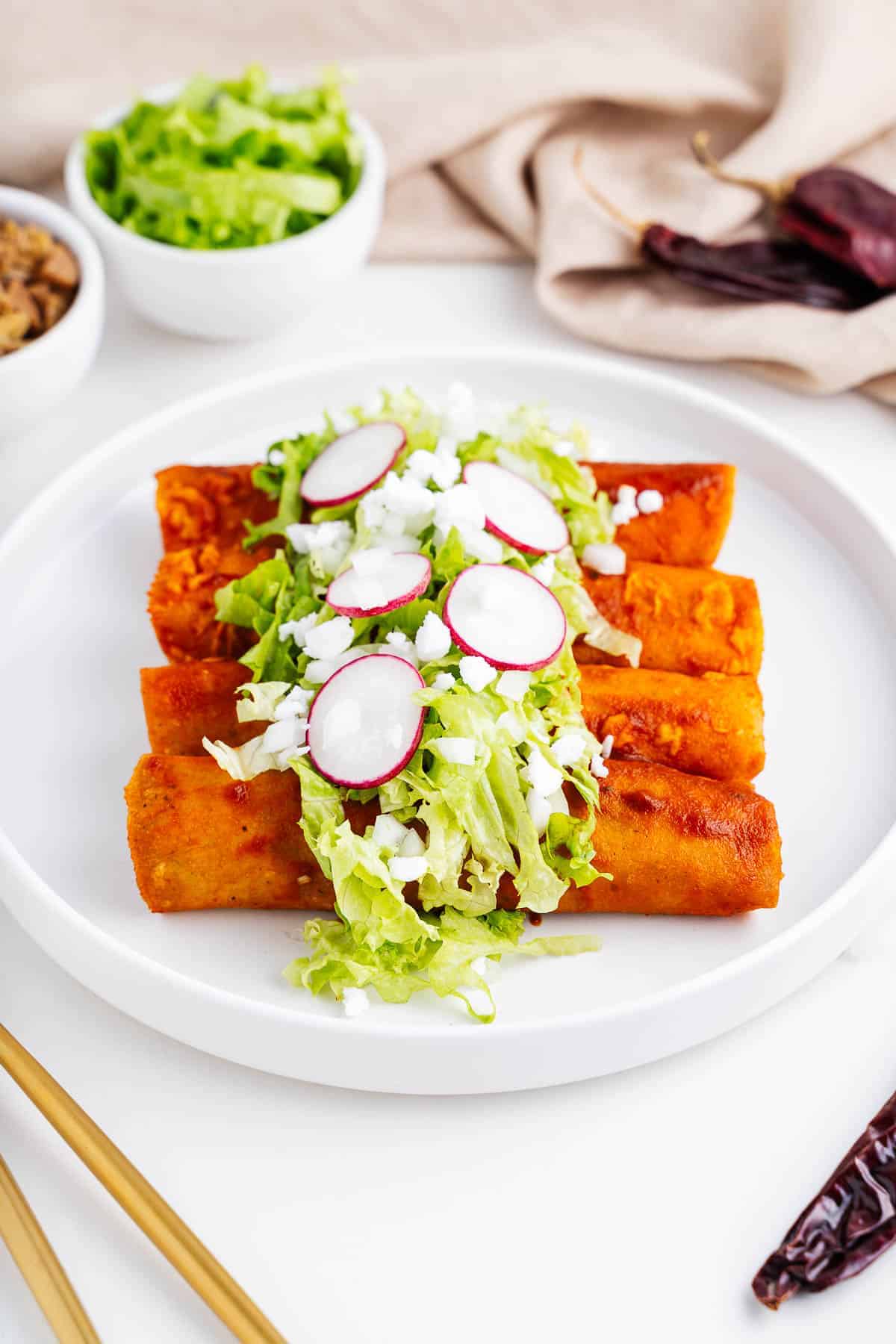 Vegan Enchiladas Rojas on a Plate.