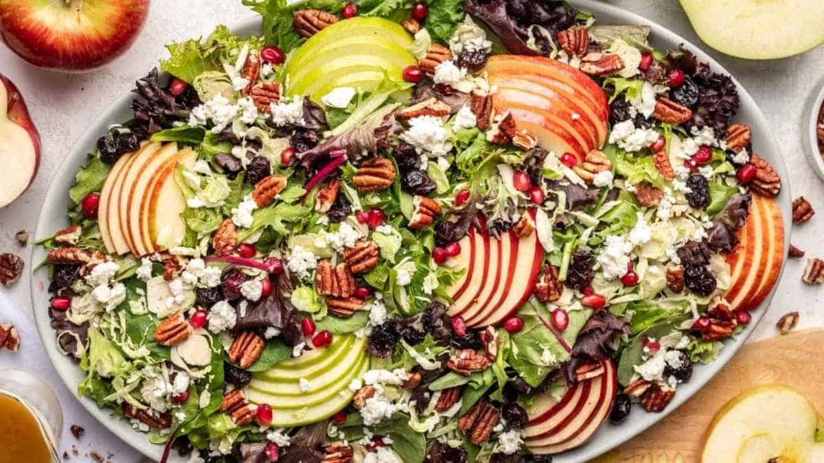 A salad with apples and pecans.
