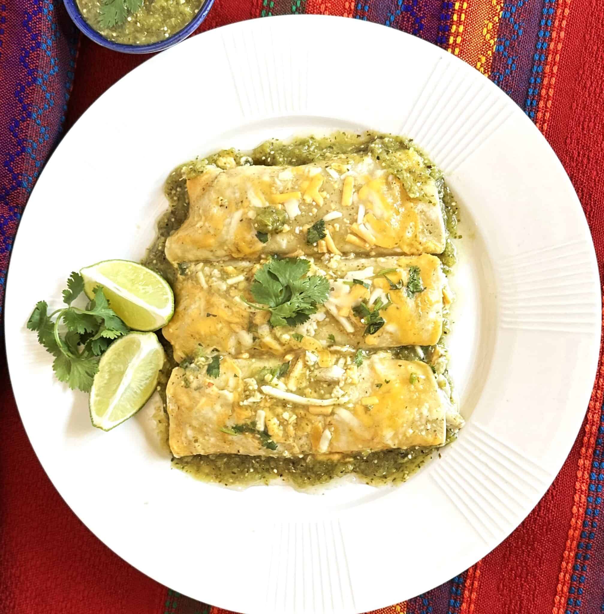 chicken enchiladas on a plate.