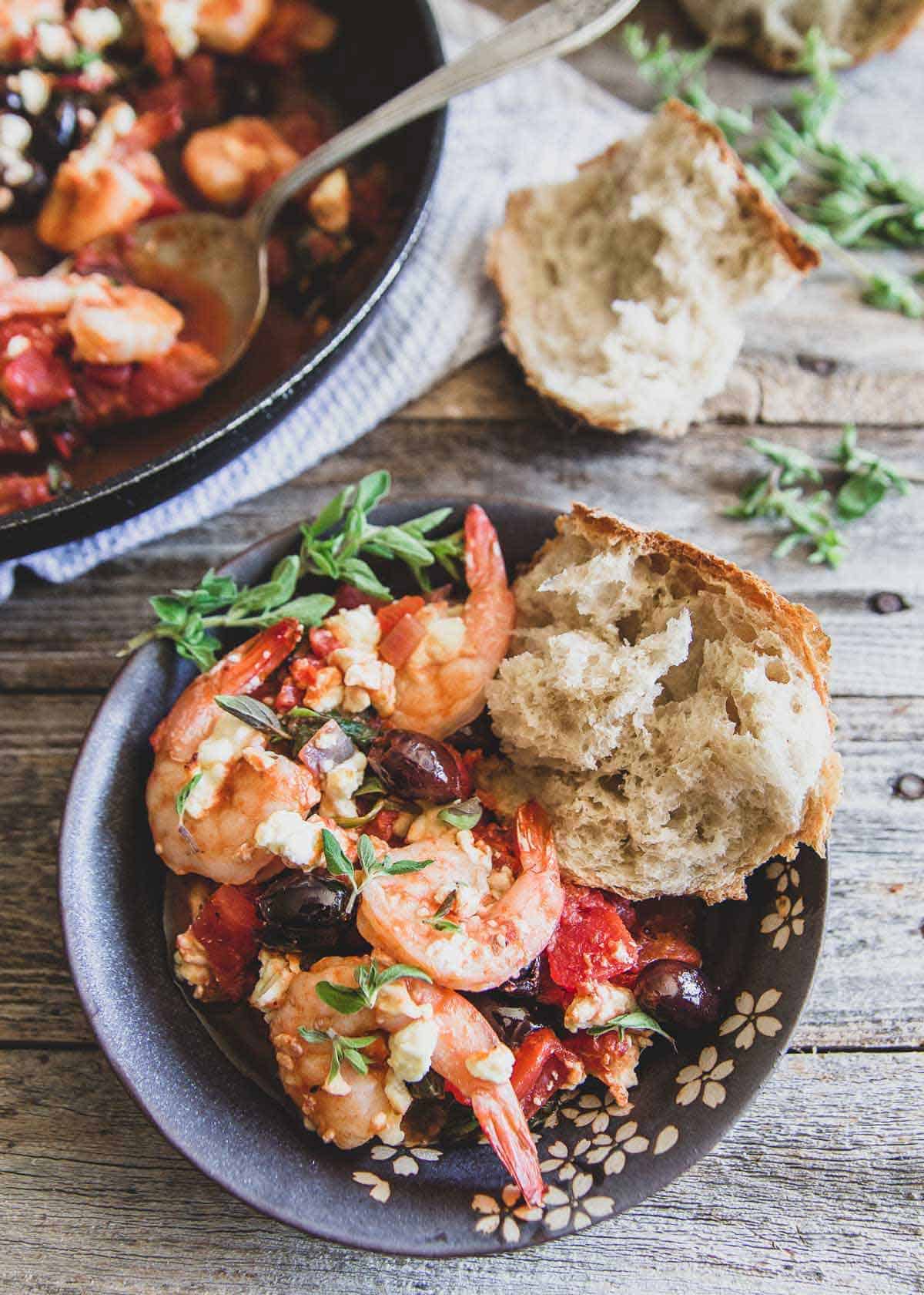This Greek shrimp skillet is an easy 30 minute meal with tomatoes, spinach, Kalamata olives, feta and lots of fresh oregano and lemon flavor. / This Greek shrimp skillet is an easy 30 minute meal with tomatoes, spinach, Kalamata olives, feta and lots of fresh oregano and lemon flavor.
