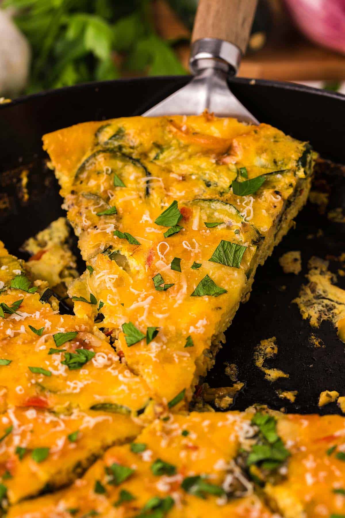 An Italian Style vegetable frittata in a skillet.