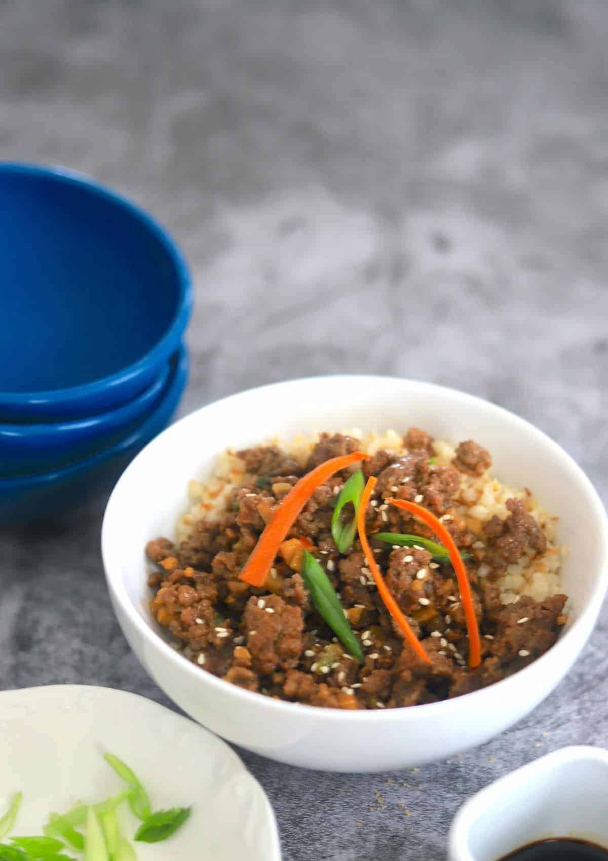 hoisin beef in a white bowl.