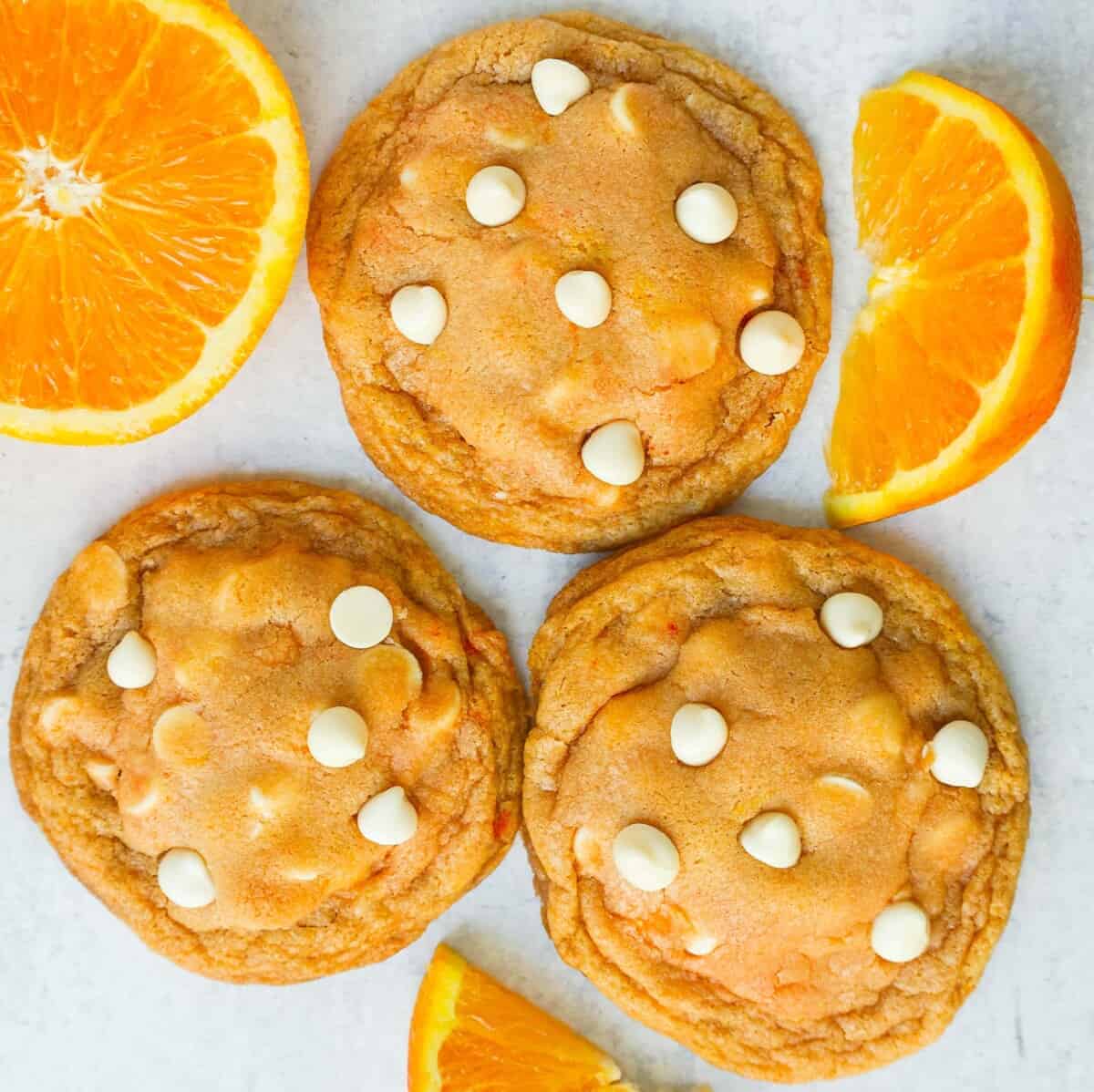 Orange cookies with white chocolate chips and orange slices are a unique twist on the classic cookie recipes.