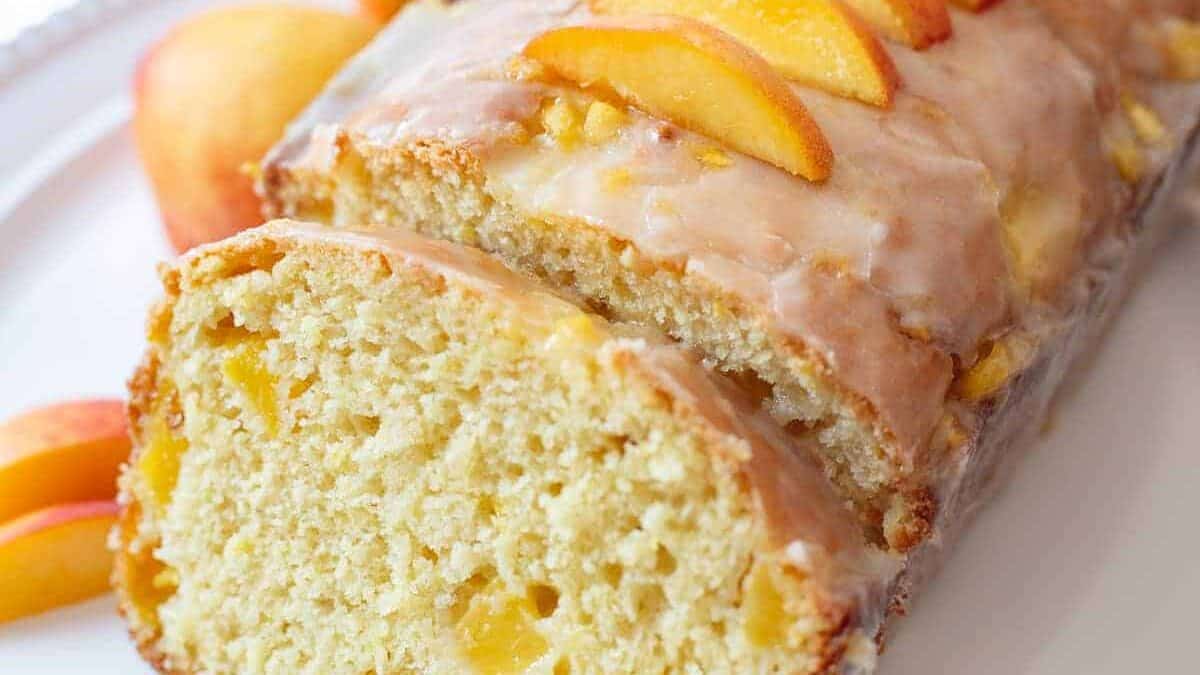 A slice of peach bread on a plate.