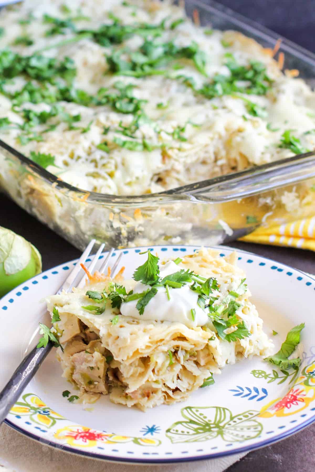 serving of casserole on plate with fork. 