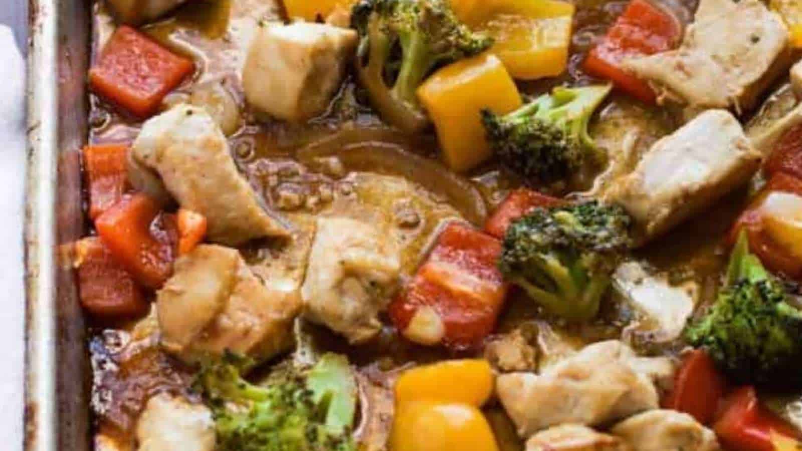 Chicken and vegetables in a baking dish.