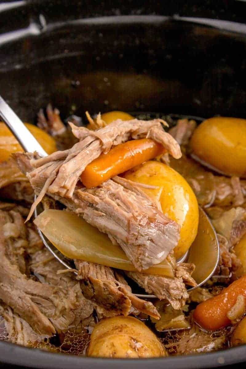 spoonful of sirloin tip roast in the crock pot.
