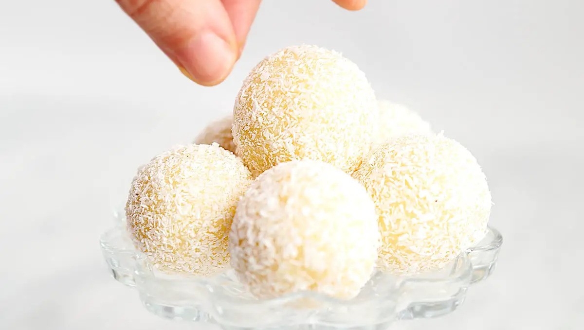 Coconut truffles on a plate.