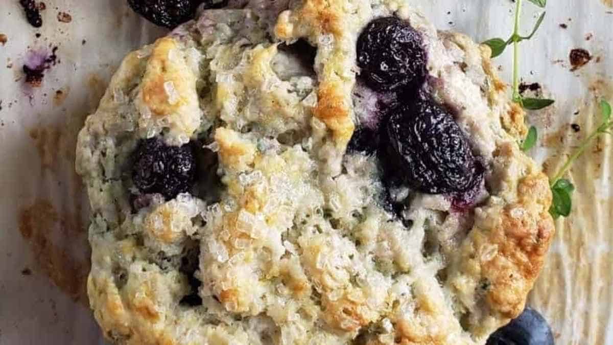 Blueberry scones on a baking sheet.