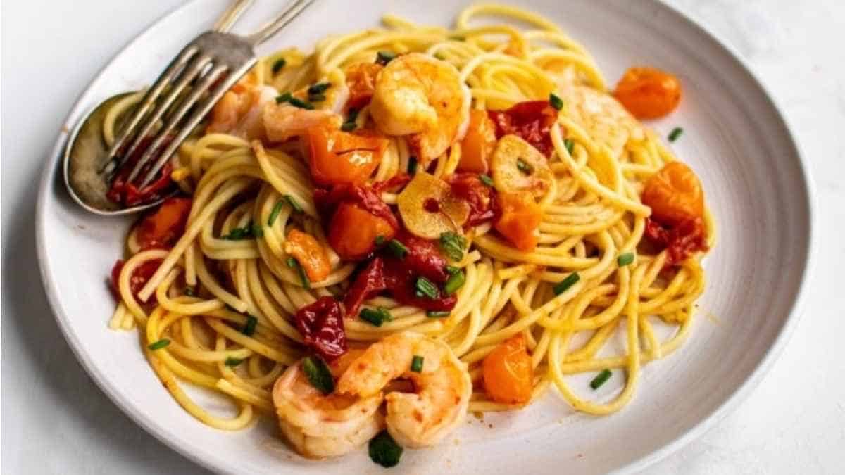 Spaghetti With Saffron Roasted Tomatoes and Shrimp. 