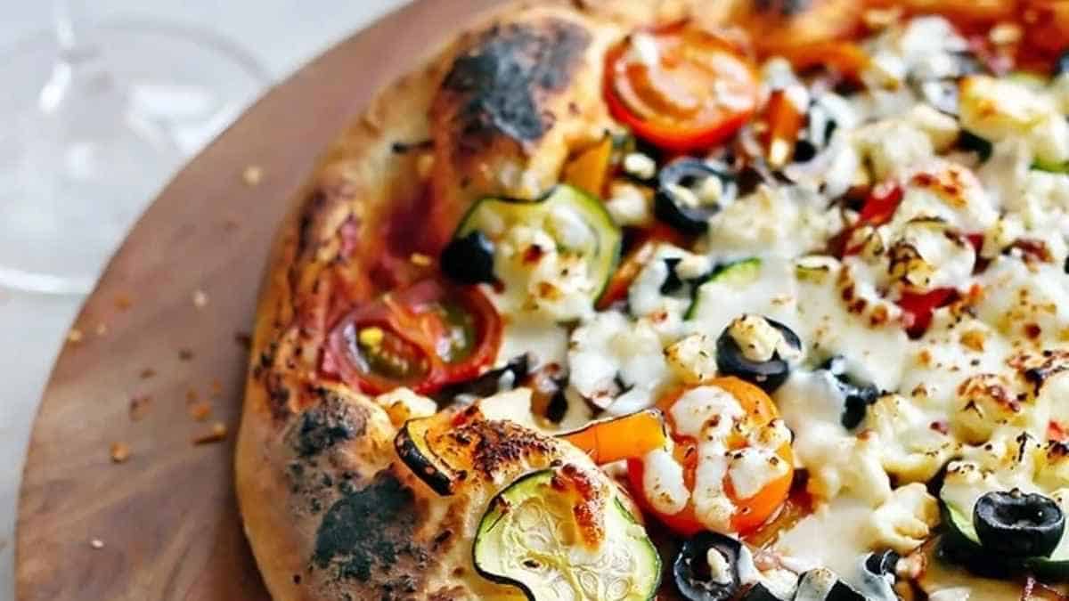 Supreme Vegetarian Pizza with Mozzarella and Feta.