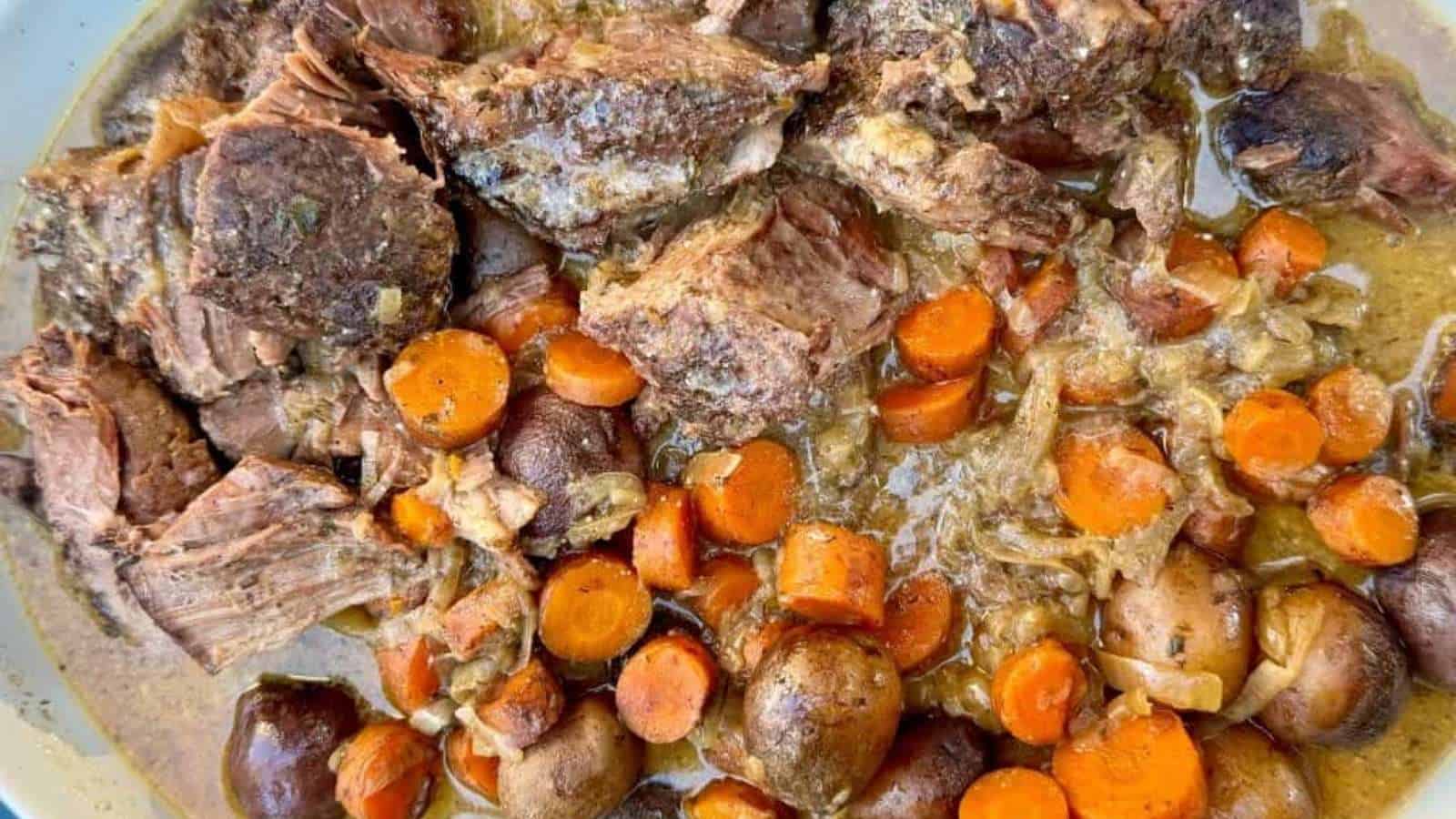 Slow cooker beef stew with carrots and potatoes.