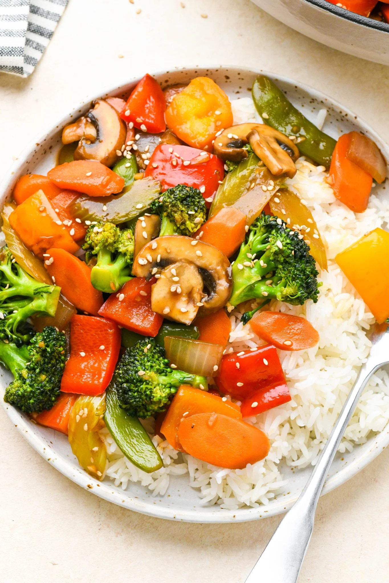 A plate of vegetables and rice.