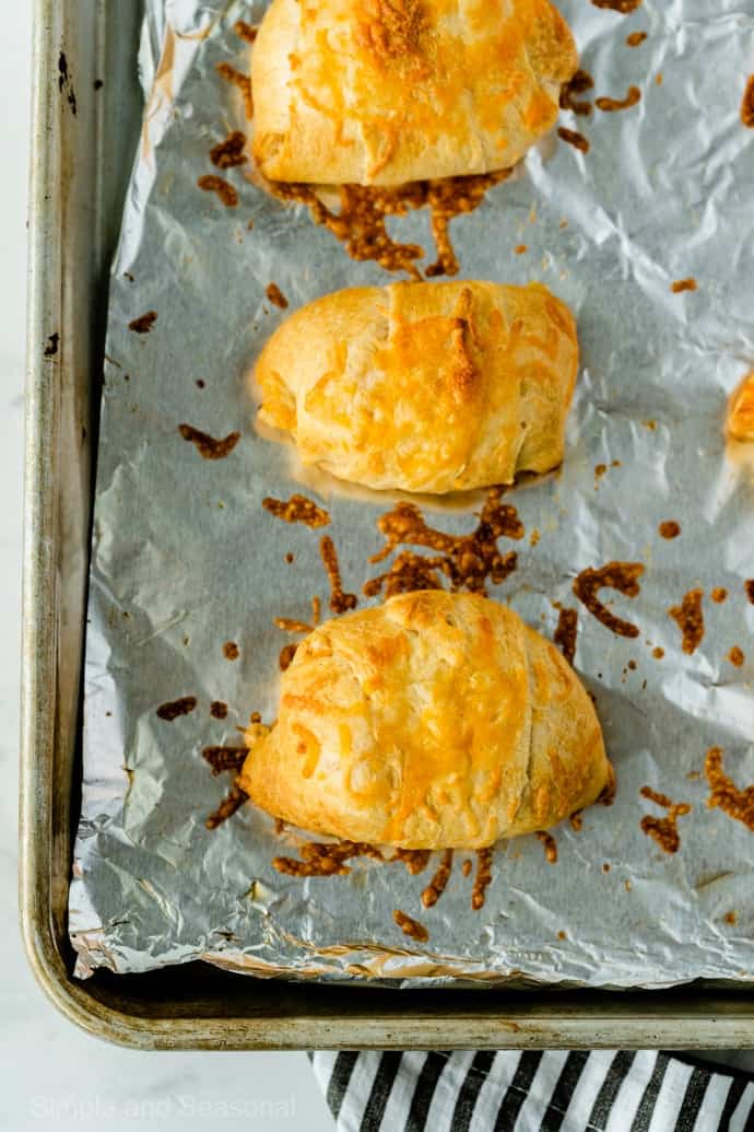 cooked puffs on baking sheet.