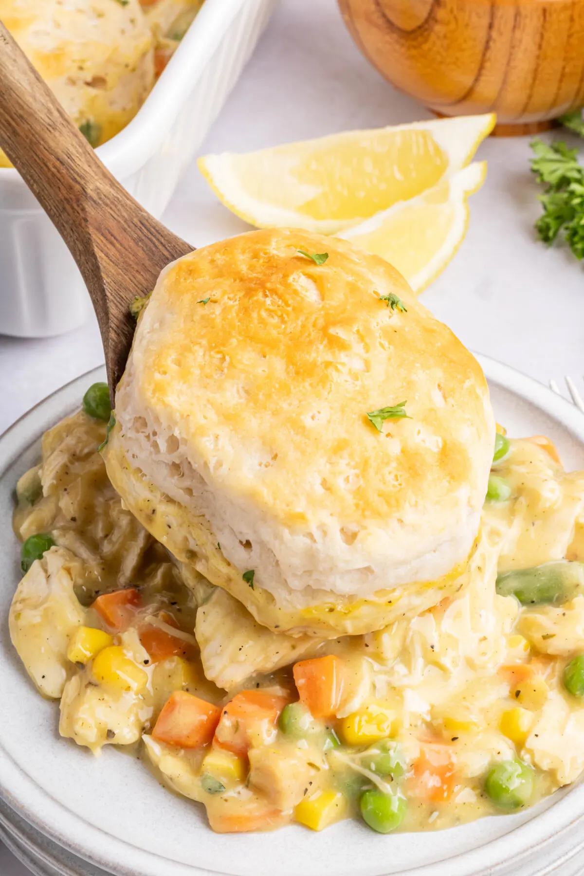 Get your family together for a comforting weeknight meal with this easy chicken pot pie casserole recipe. It's an effortless hearty meal! 
