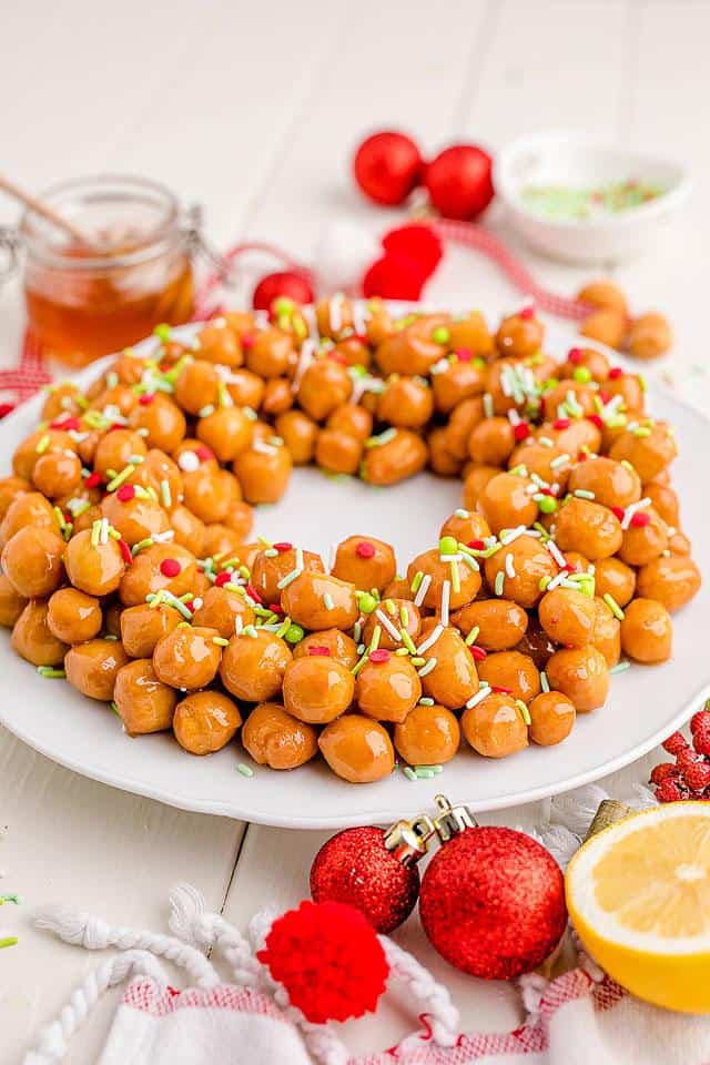 Food blogger, Bella Bucchiotti of xoxoBella, shares a dessert recipe for homemade Italian struffoli or tasty Christmas honey balls. 
