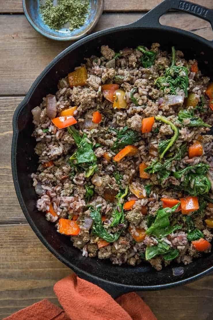One-Skillet Ground Beef and Wild Rice with onion, garlic, rainbow chard, and bell pepper - an easy, quick well-balanced meal recipe ready in under 1 hour.