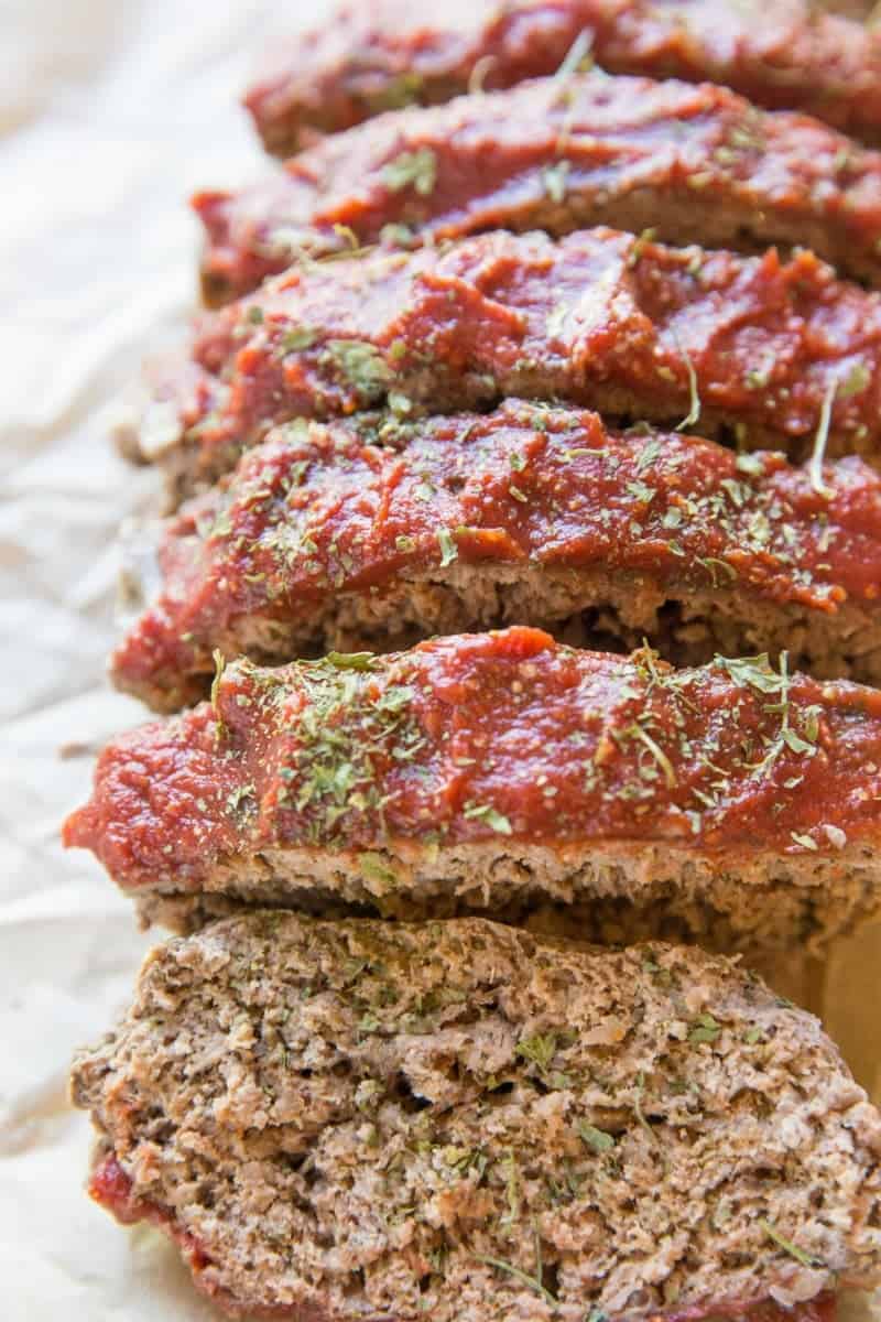 Grain-free meatloaf sliced into individual slices, ready to serve. 
