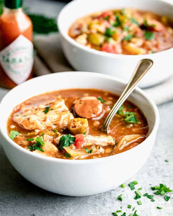 two bowls of Chicken Gumbo made in a slow cooker 
