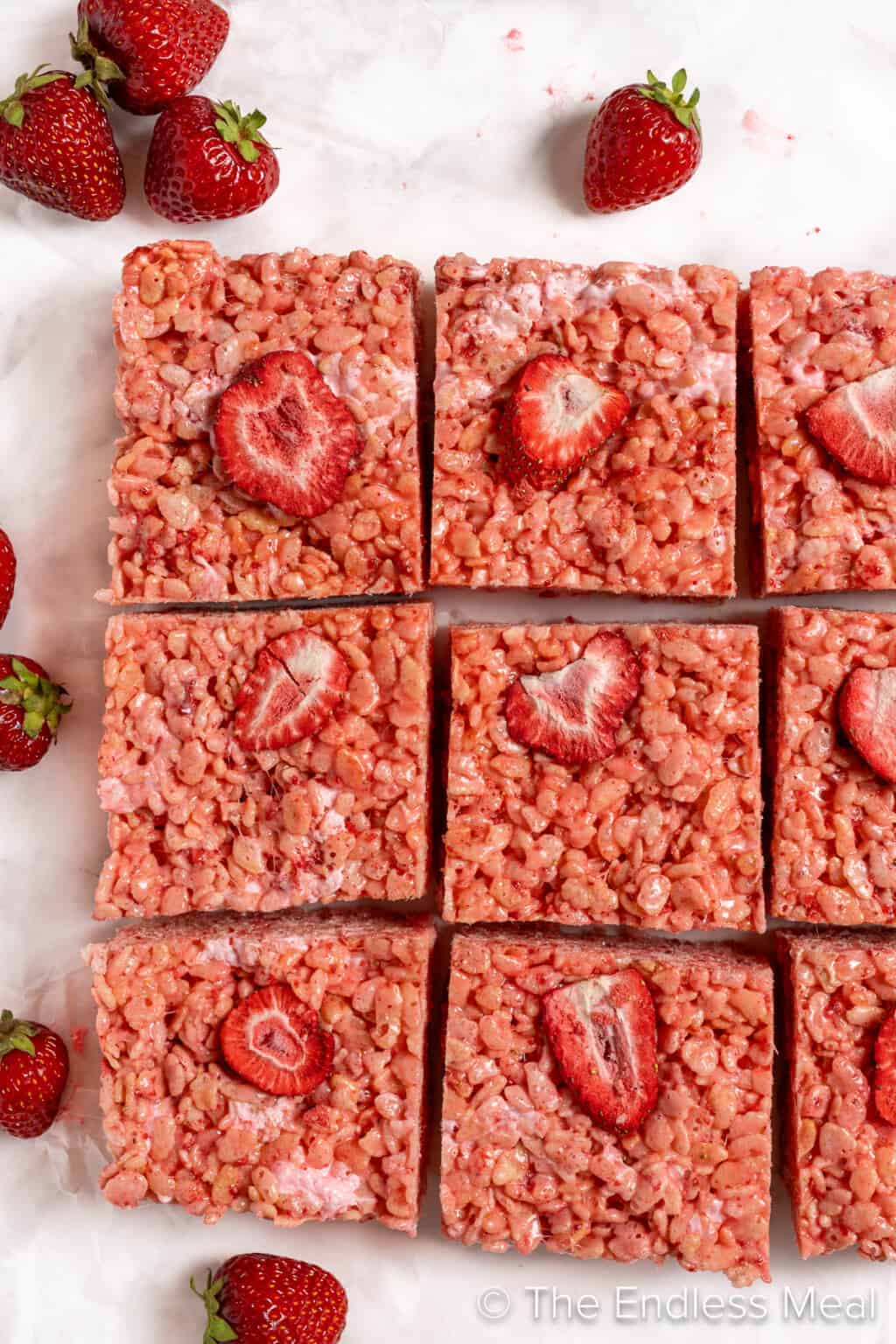 Strawberry Rice Krispie Squares topped with freeze dried strawberries.
