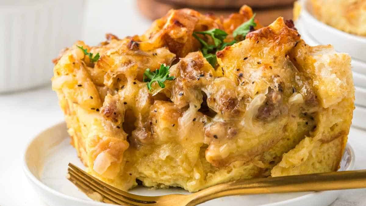 French toast casserole on a plate with a fork.
