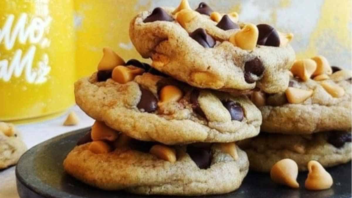 A stack of chocolate peanut butter cookies on a plate.