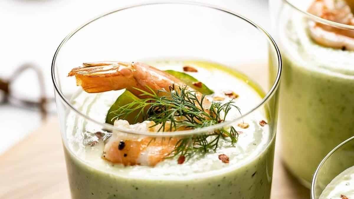 A green drink with shrimp and dill.
