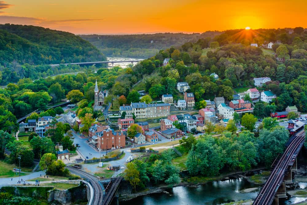 An aerial view of a small town at sunset.