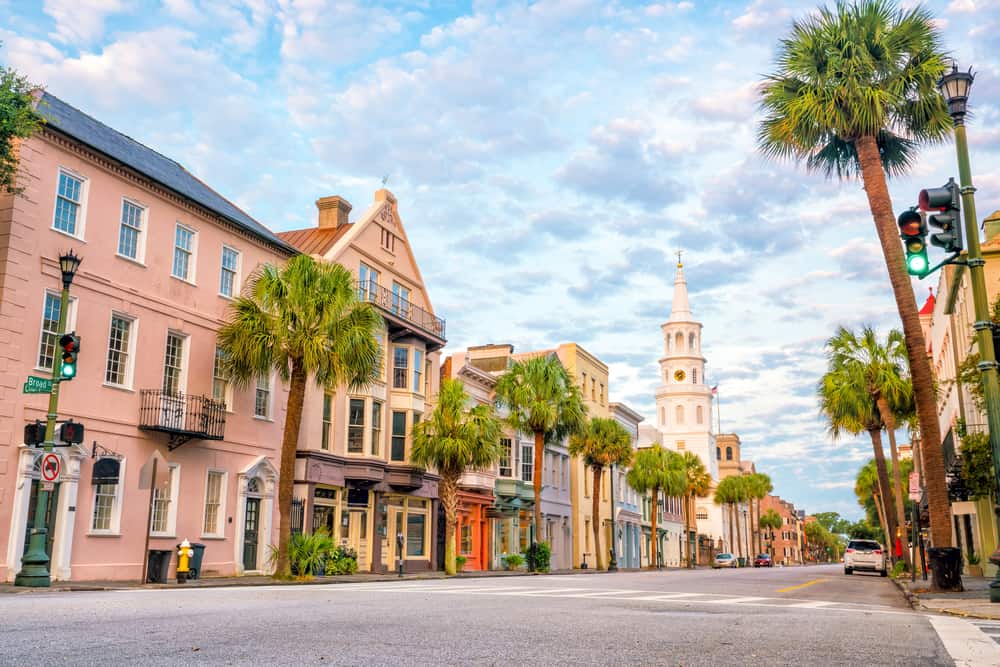A street in charleston, south carolina with palm trees.
