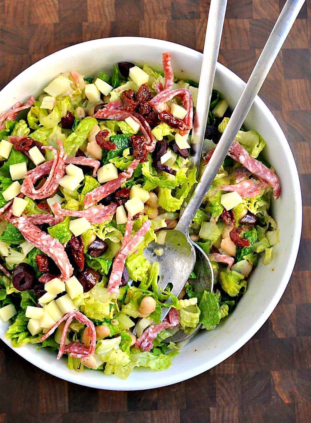A bowl of gluten-free salad with meat and vegetables.