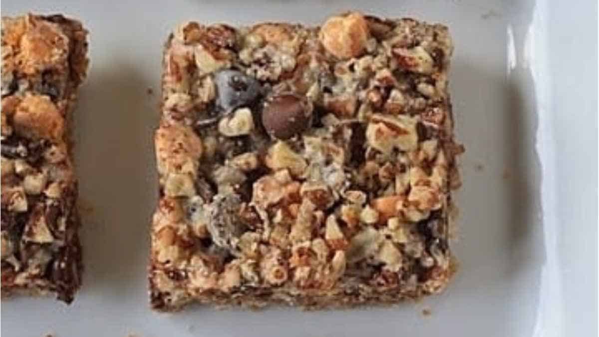 A plate of granola bars on a white plate.