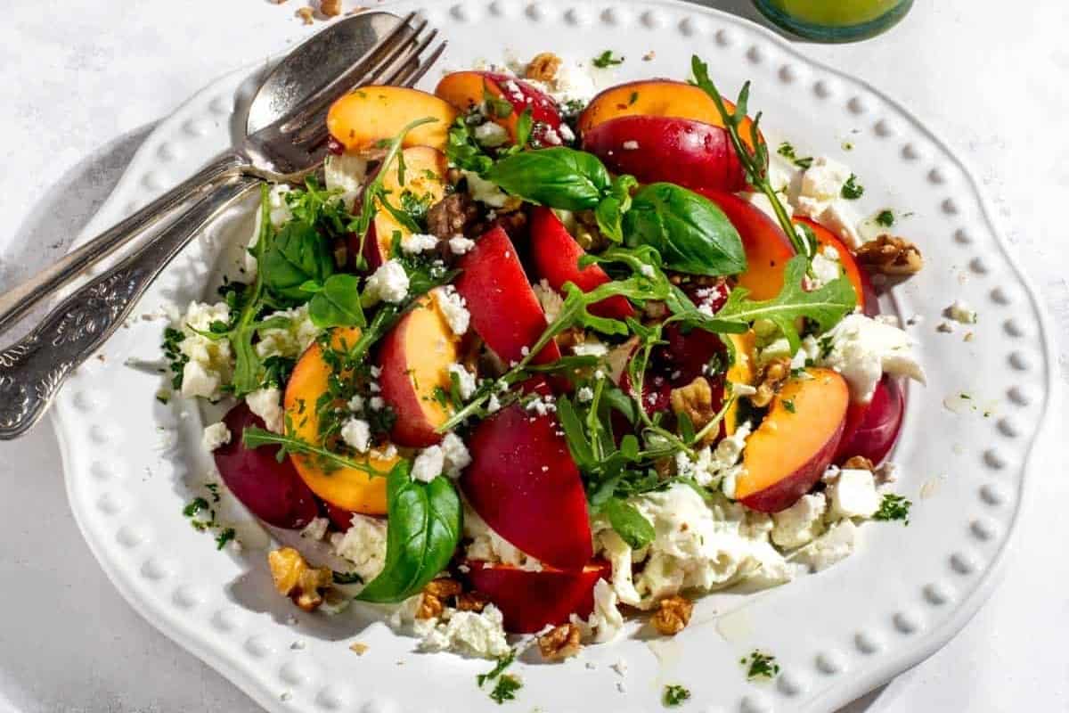 Peach salad with goat cheese and walnuts.
