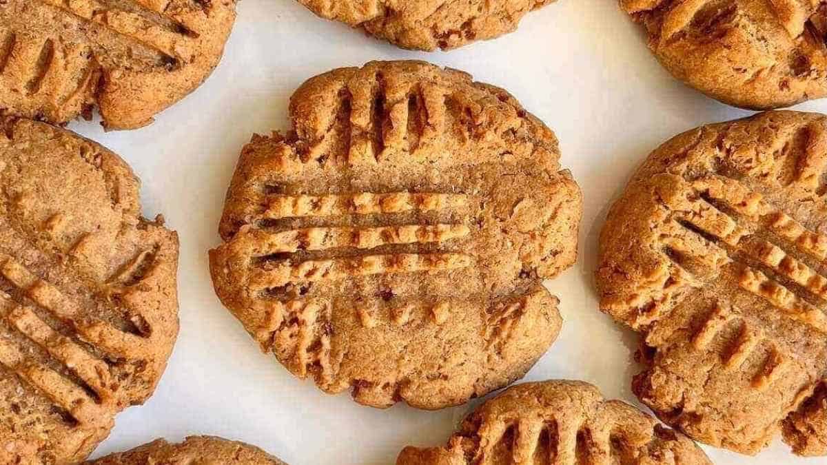 Peanut butter cookies on a white surface.