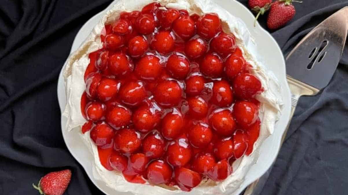 A plate of food with strawberries on it.