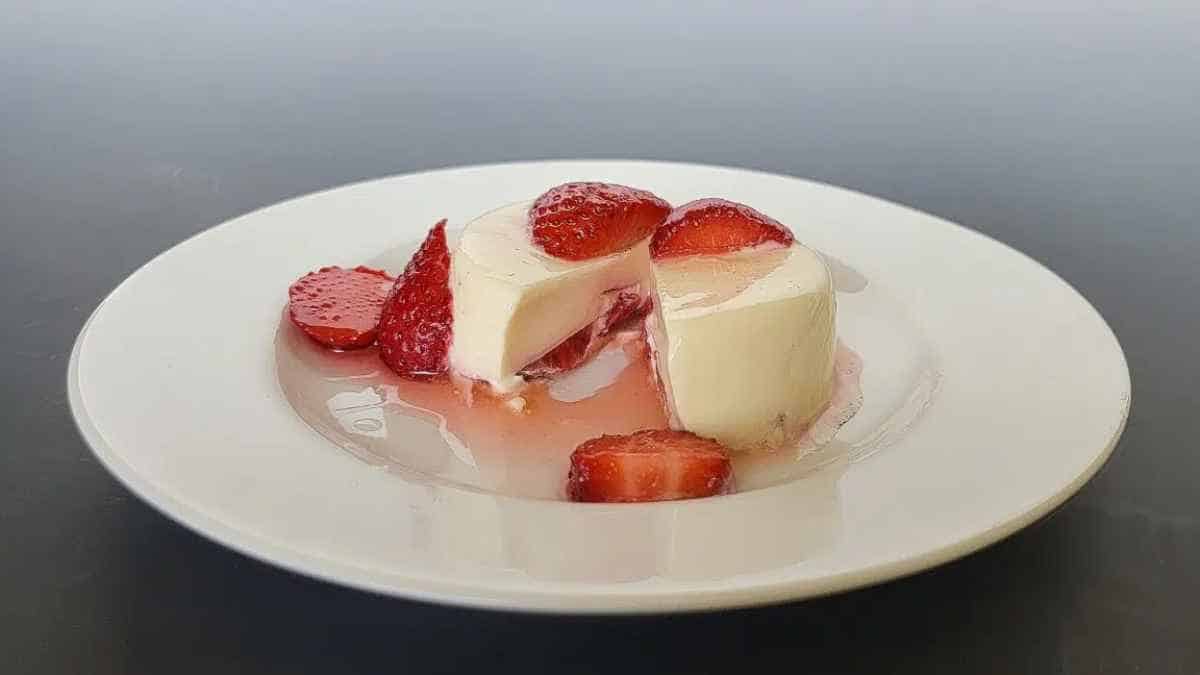 A plate of food with strawberries on it.