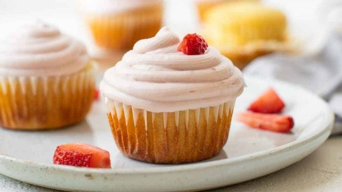 Strawberry cupcakes on a white plate.