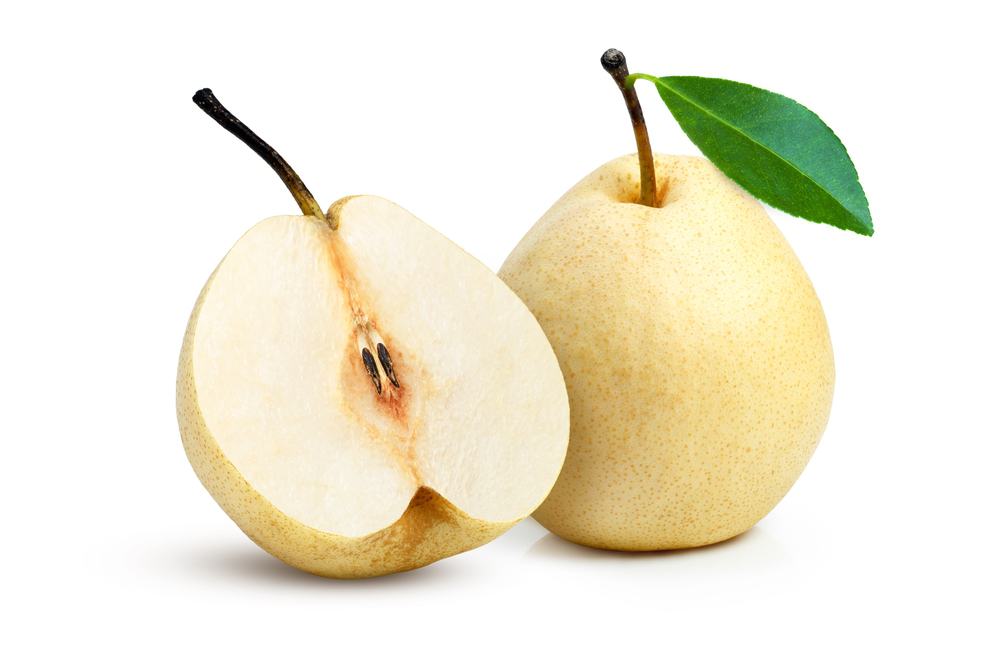 One whole pear and one half-cut pear with a leaf isolated on a white background.
