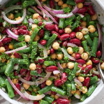 A bowl of bean and chickpea salad.