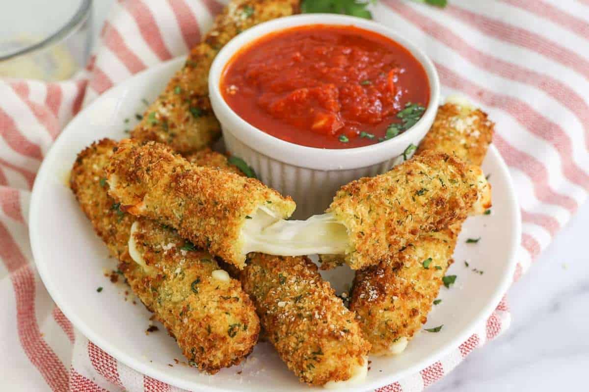 Crispy Homemade Air Fryer Mozzarella Sticks. 