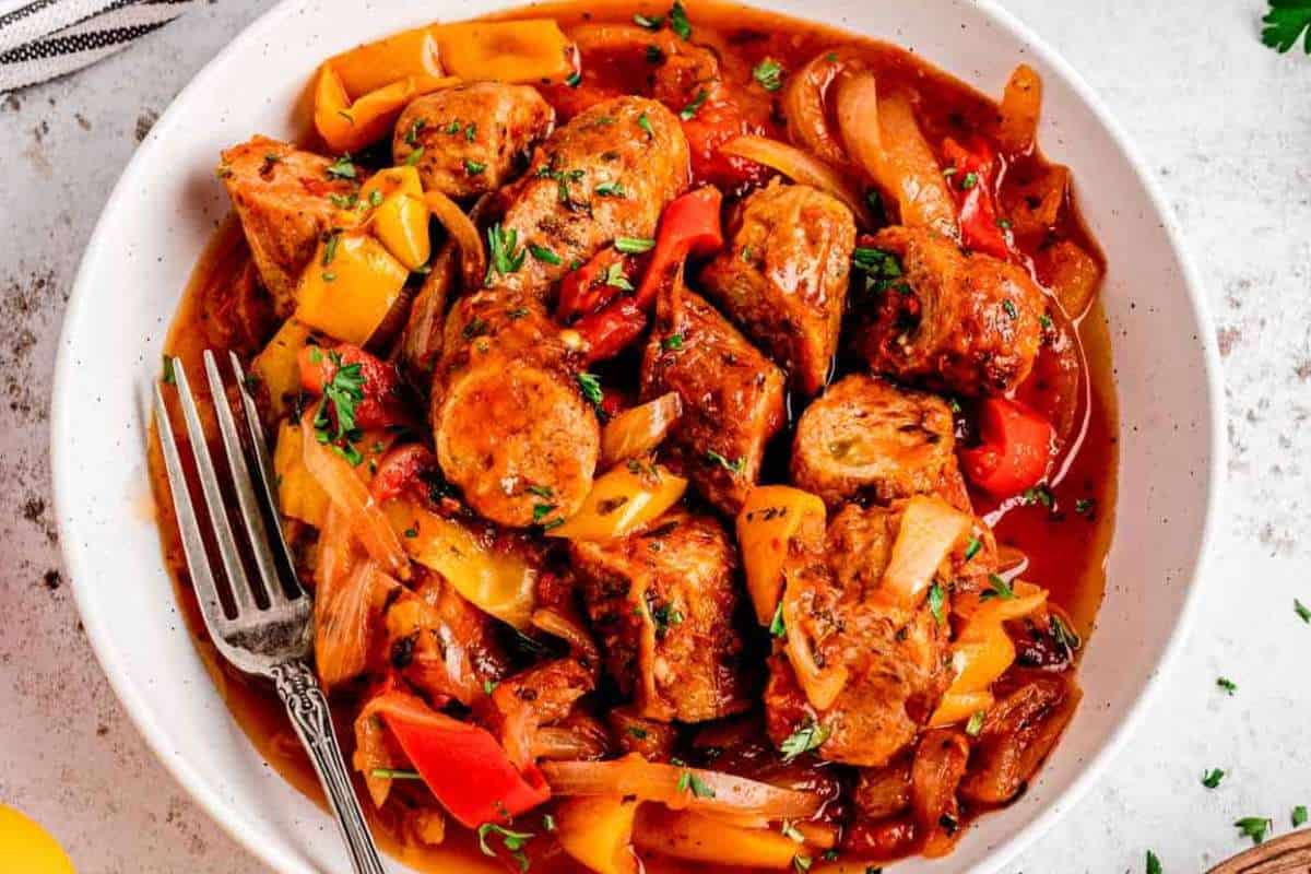 Crockpot Sausage Peppers And Onions With Sauce. 